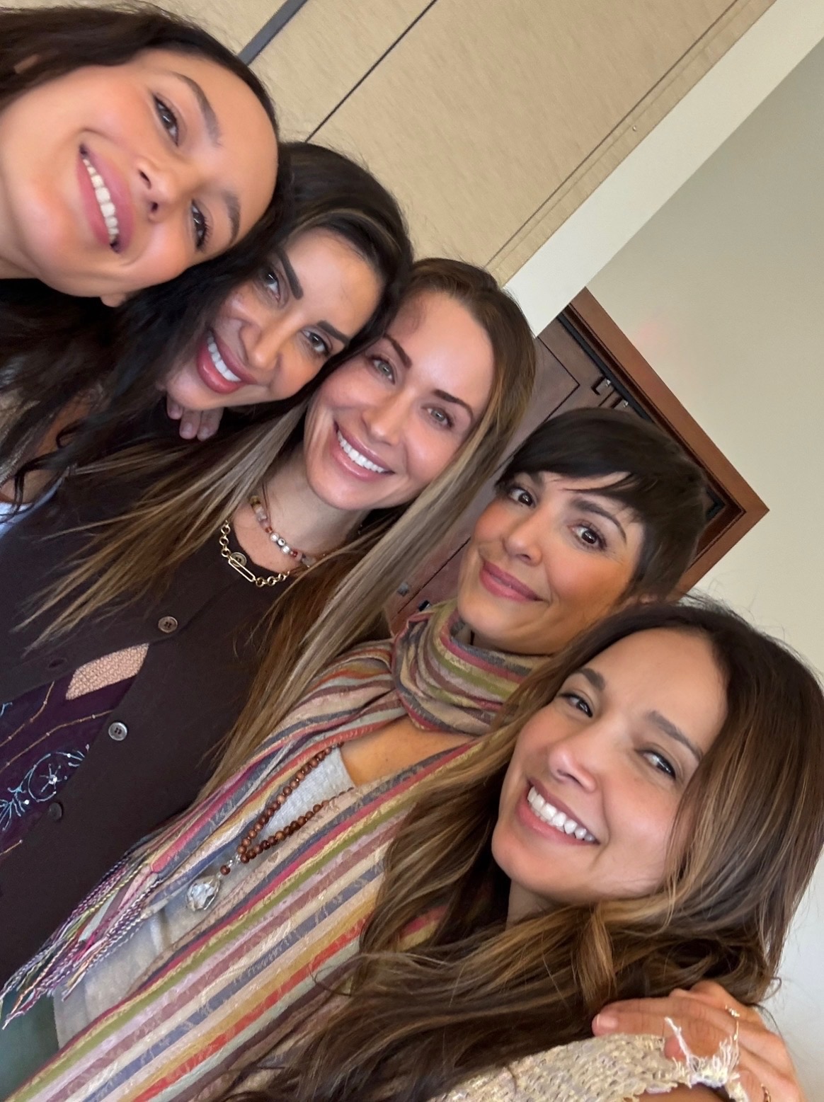 Women collaborators selfie together