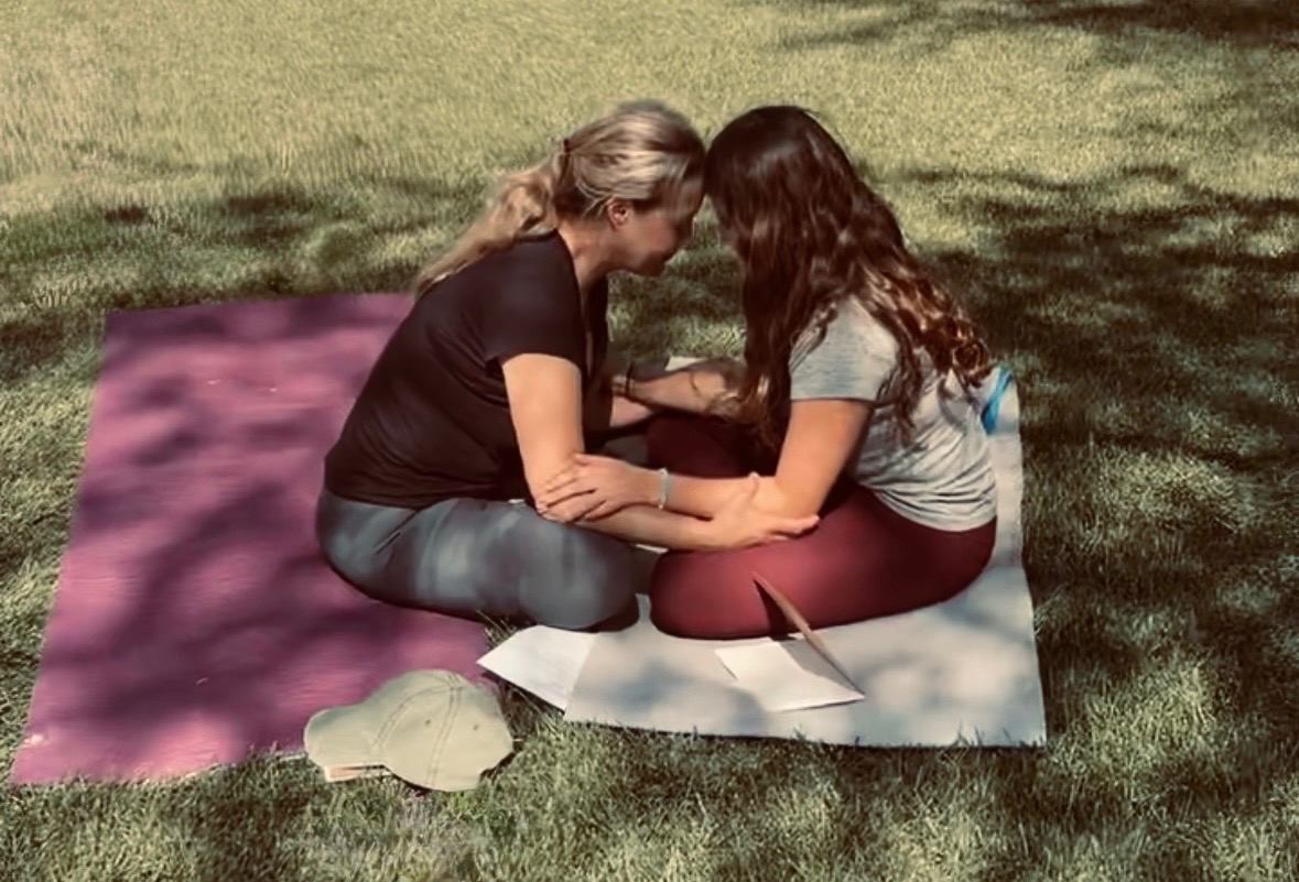 Intimate connection moment during workshop